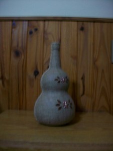 Botella forrada con arpillera + accesorios