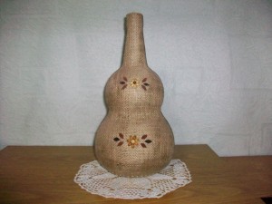 Botella forrada con arpillera + accesorios