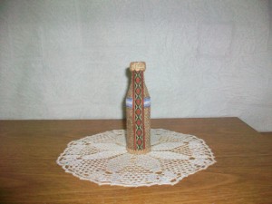 Botella forrada con arpillera + accesorios