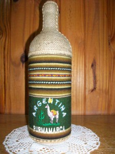 Botella forrada con arpillera + decoupage